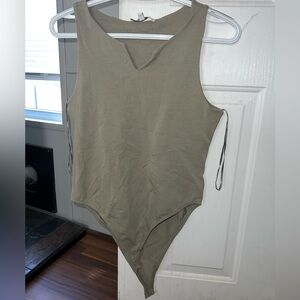 Green bodysuit , v-neck short sleeve style